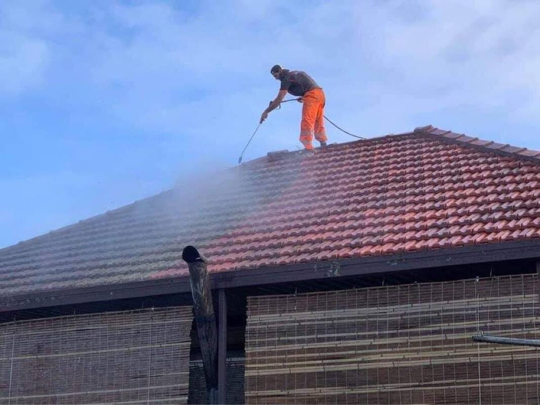 Local roof repairs in Heidelberg, our Heidelberg roof restoration team is carrying out roof repairs and roof restoration on this terracotta tile roof