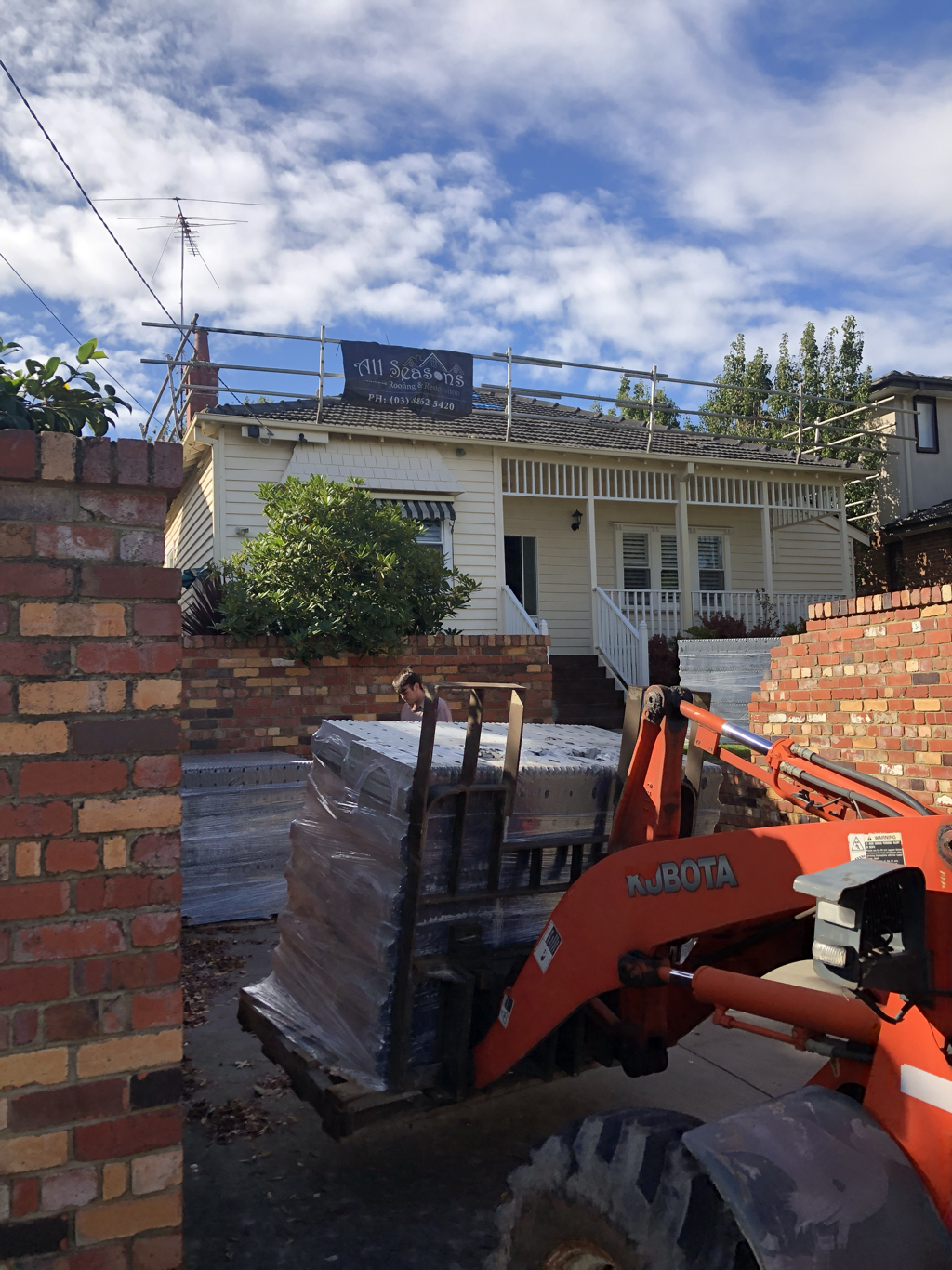 Roof replacement underway in camberwell, local roofing experts replacing existing tiles with new concrete tiles on this camberwell home 